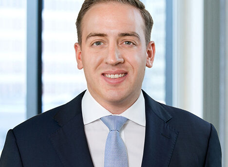 A professional headshot of Stephen Lapatin in front of windows.